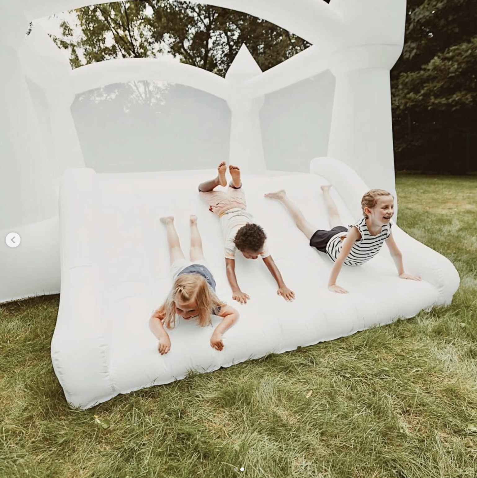 Kids enjoying the White Castle Bounce House