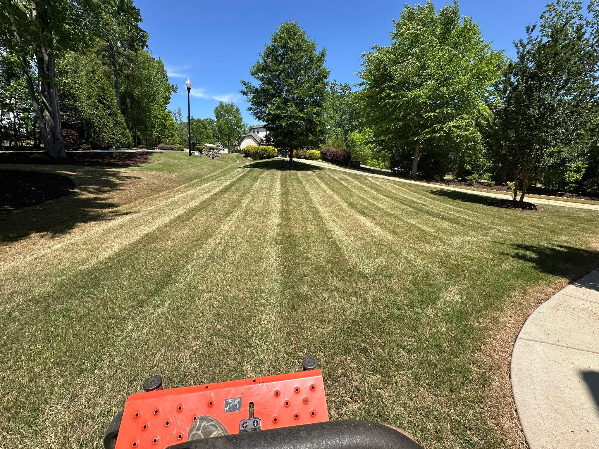 Perfect mowing stripes on a large lawn